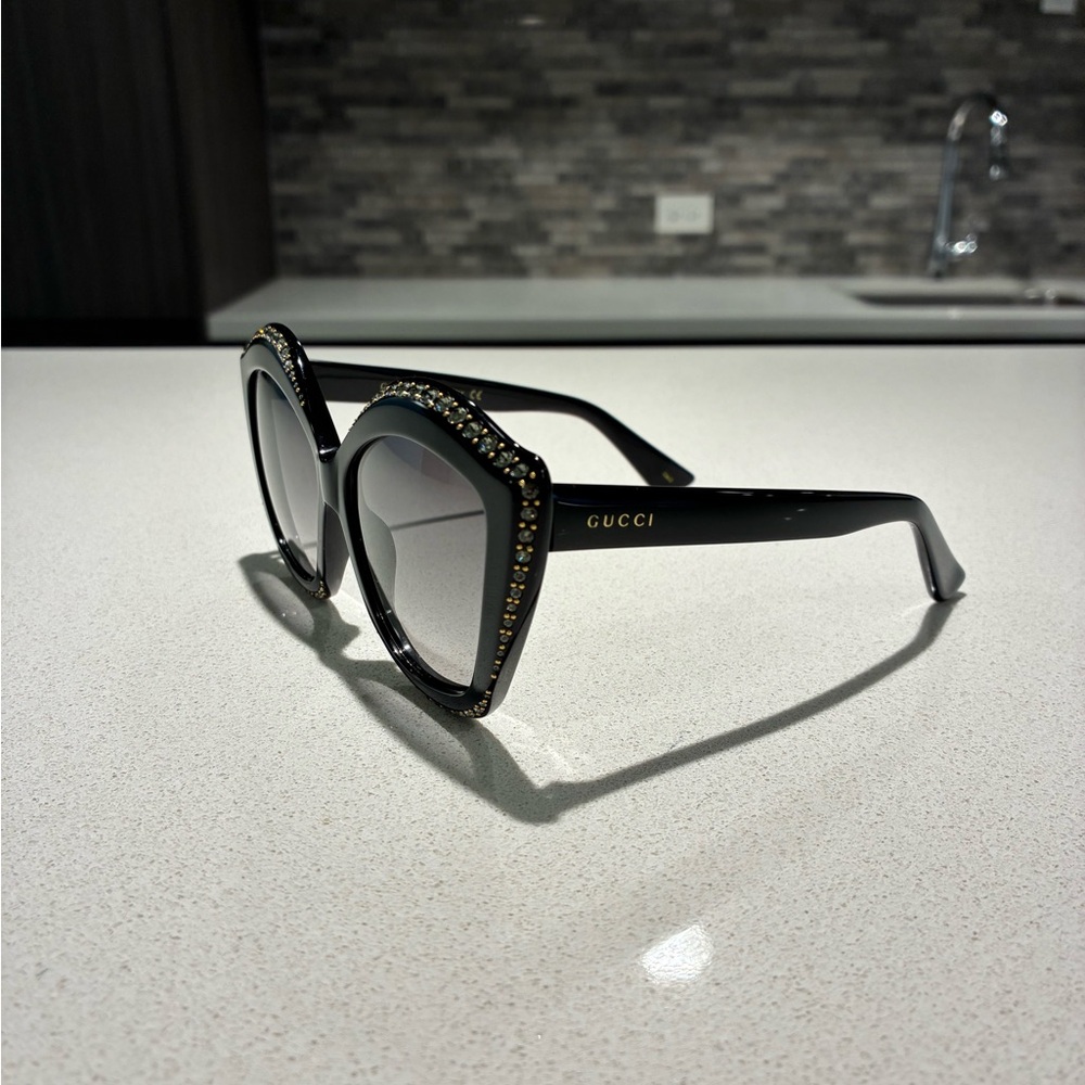 Gucci Black Sunglasses with Gold Detailing